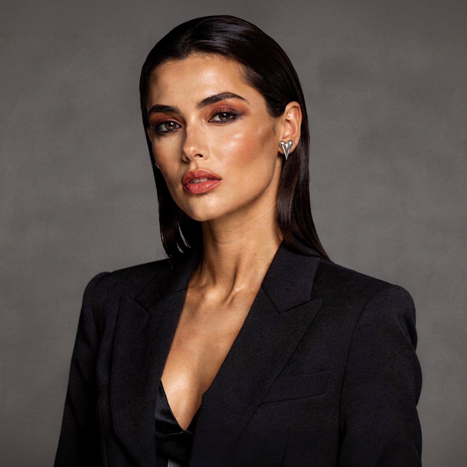 Luxury earrings collection featuring crystal, pearl, and statement earrings by LUMI