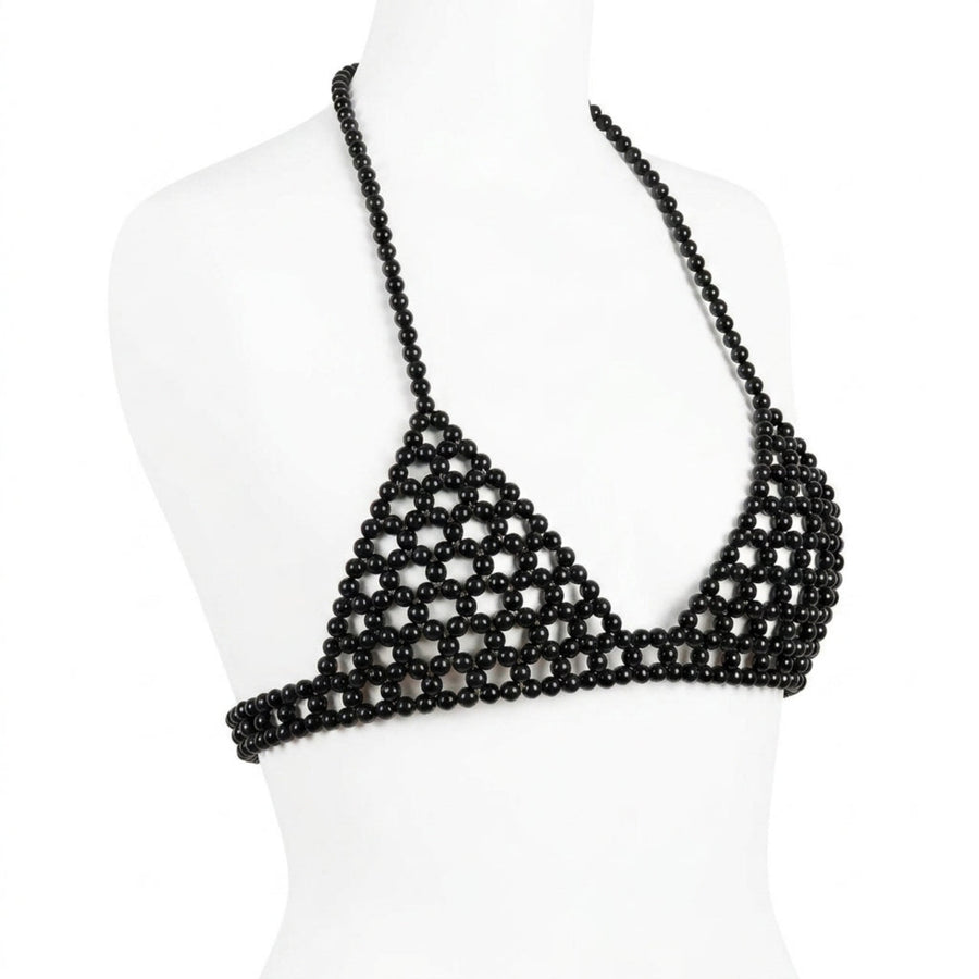 Handmade ivory pearl body jewelry bra with adjustable gold-tone chains by LUMI.