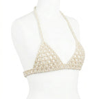 Handmade ivory pearl body jewelry bra with adjustable gold-tone chains by LUMI.