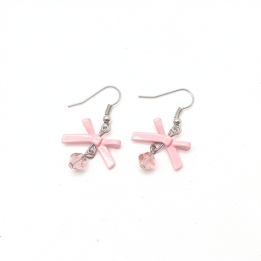 LUMI Blush Ribbon Drop Earring with a soft blush ribbon drop silhouette