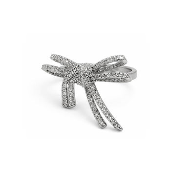 LUMI Crystal Bow Ring with a bow shape with crystal-style shine