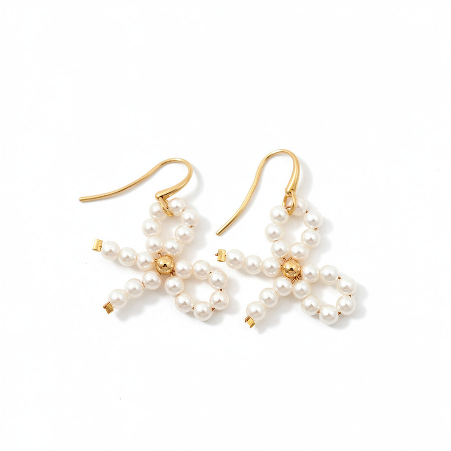 Handmade LUMI Ivory Pearl Bow Earring with bow motif and pearl-look detail