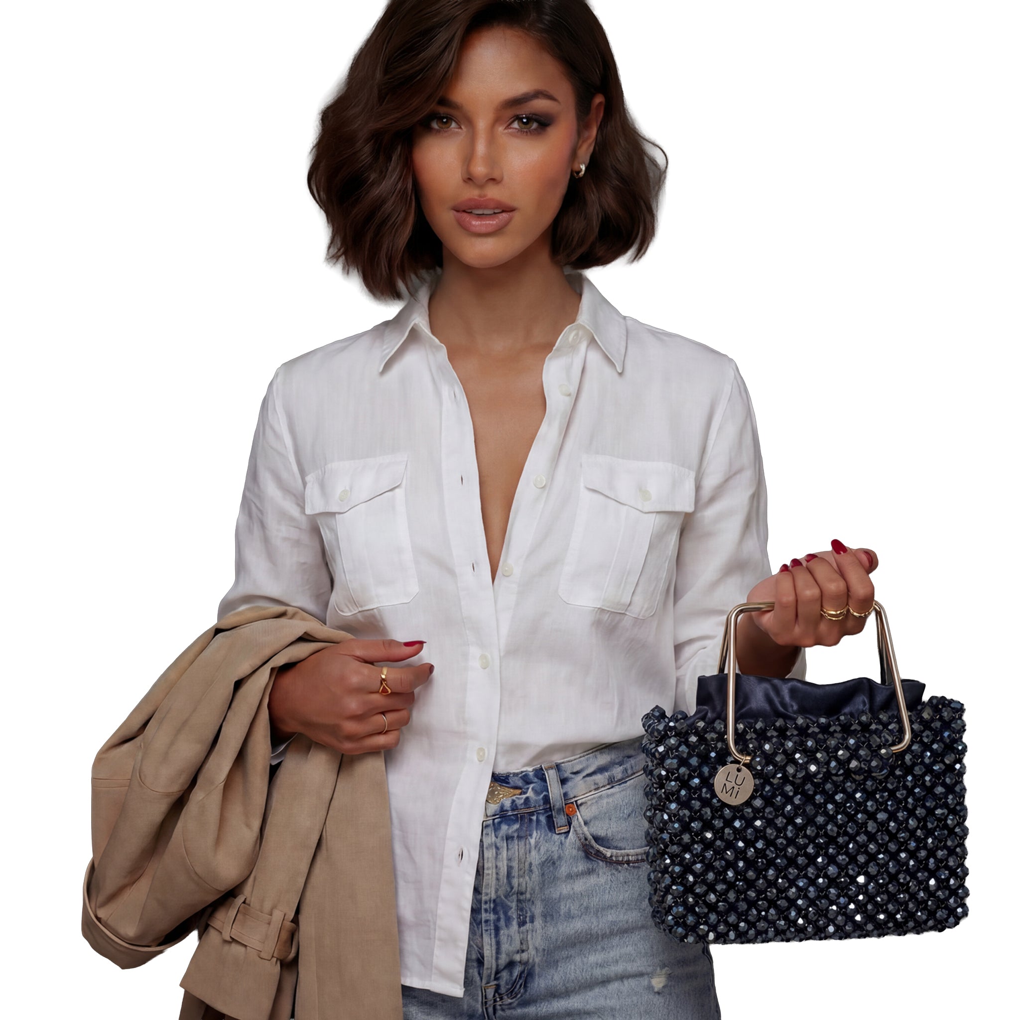 Model holding the handmade navy crystal handbag by Lumi for an elegant evening look.