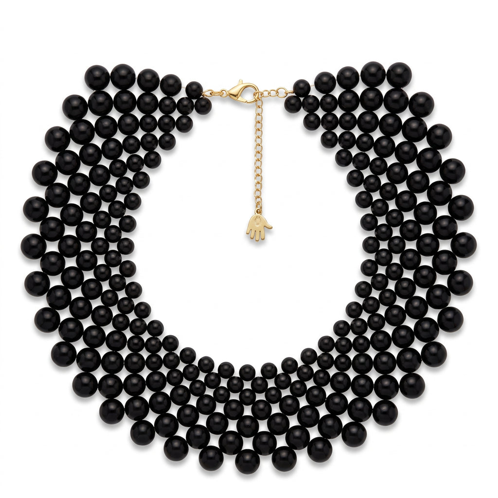 Back view of the LUMI The Noir Cascade Jewelry Set showing the necklace clasp, adjustable extension chain, and matching earrings