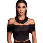 Model wearing the Noir Cascade set with a black outfit