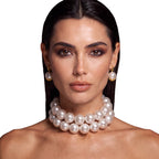 Model wearing the Royale pearl choker and matching earrings