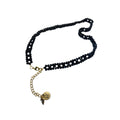 Handmade black crystal waist belt with gold-tone chain accents by LUMI.