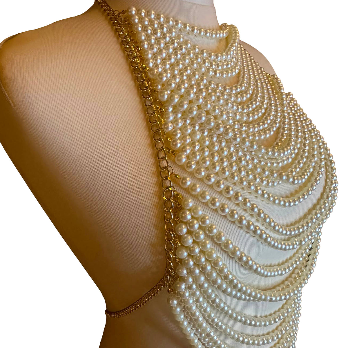 Close-up of the Aurelia pearl body top, ivory pearl layers and gold-tone chain