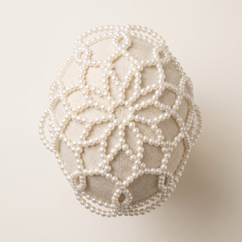Top detail of the Aurelia White Pearl Headpiece showing its handmade lattice pearl construction.