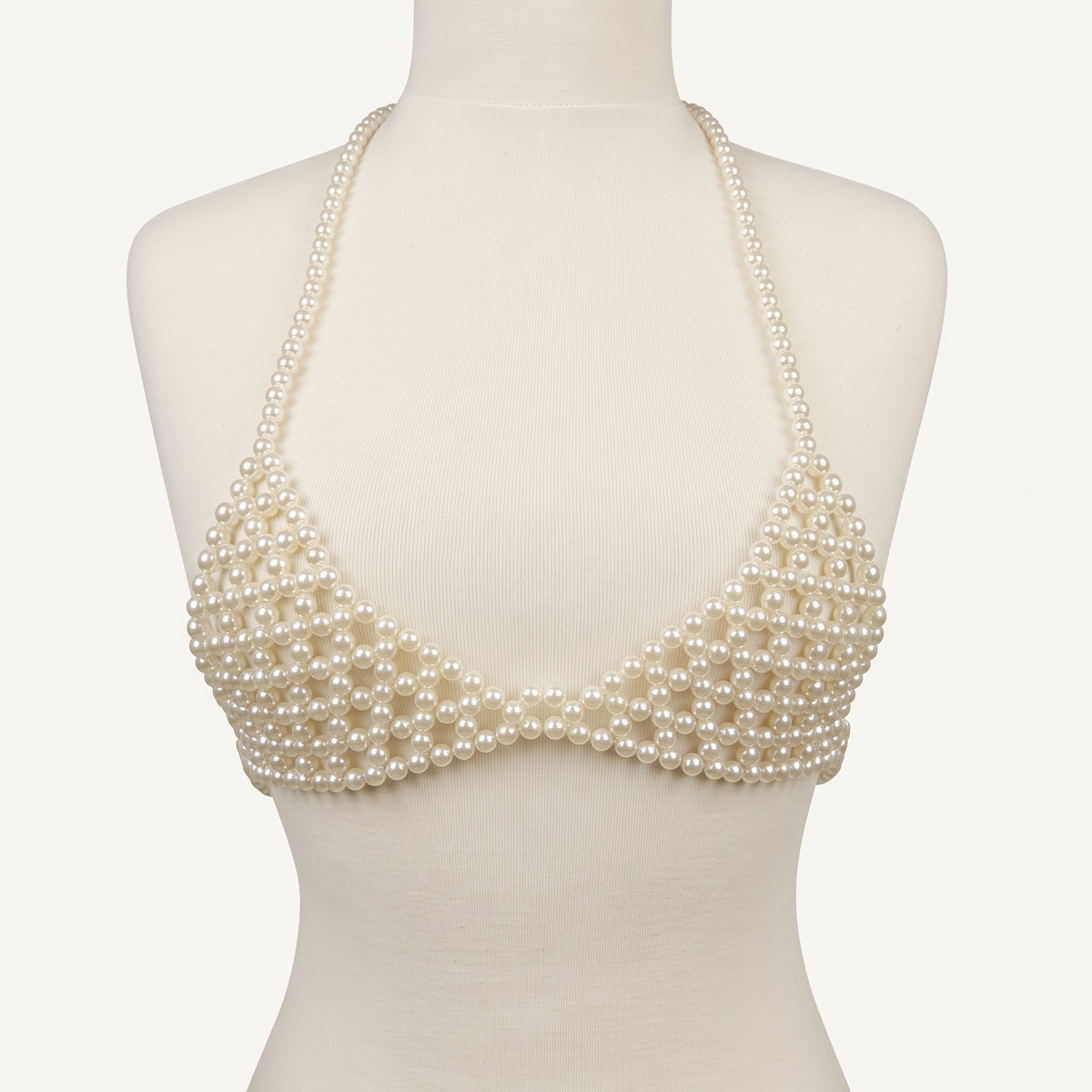 Front view of LUMI's handmade ivory pearl bra top, featuring triangular pearl-beaded cups, delicate halter straps and matching underbust bands.
