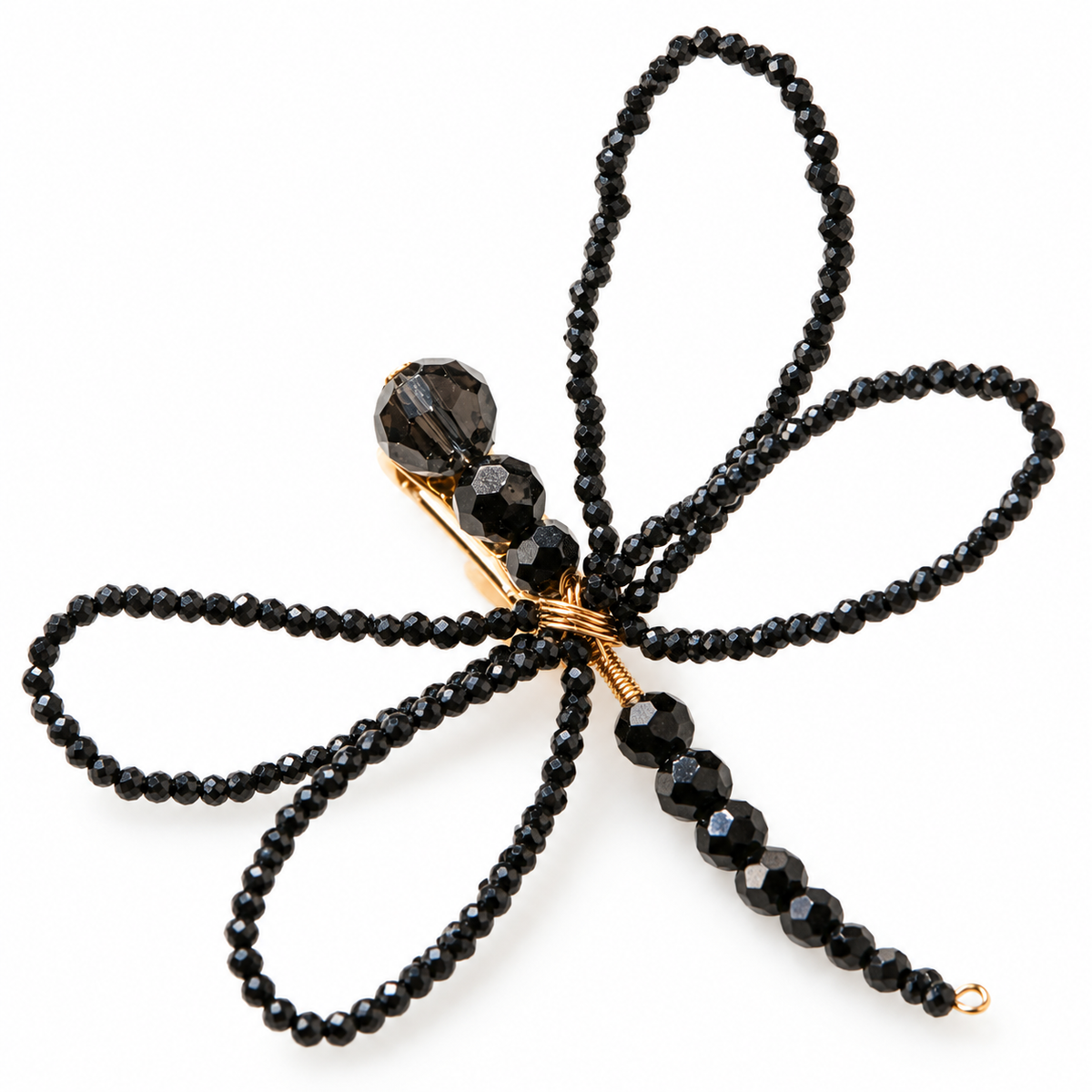 Close-up of the Libellule Navy Crystal Dragonfly Brooch by LUMI, highlighting its faceted glass crystal beads, delicate open wings and handcrafted gold-tone wirework against a white studio background.