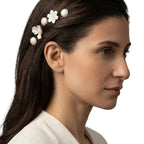Woman wearing the Nacre Bloom Gold Hair Pin Set along sleek hair above the ear for an elegant occasion look.