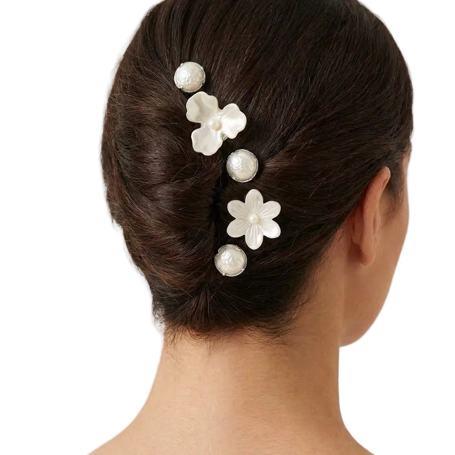 Nacre Bloom Silver Hair Pins arranged through an elegant updo with pearlescent floral and round details.