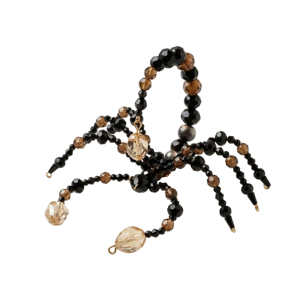 Nocturne Crystal Scorpion Brooch by LUMI with faceted black and champagne glass crystal beads, sculptural legs and a curved tail.